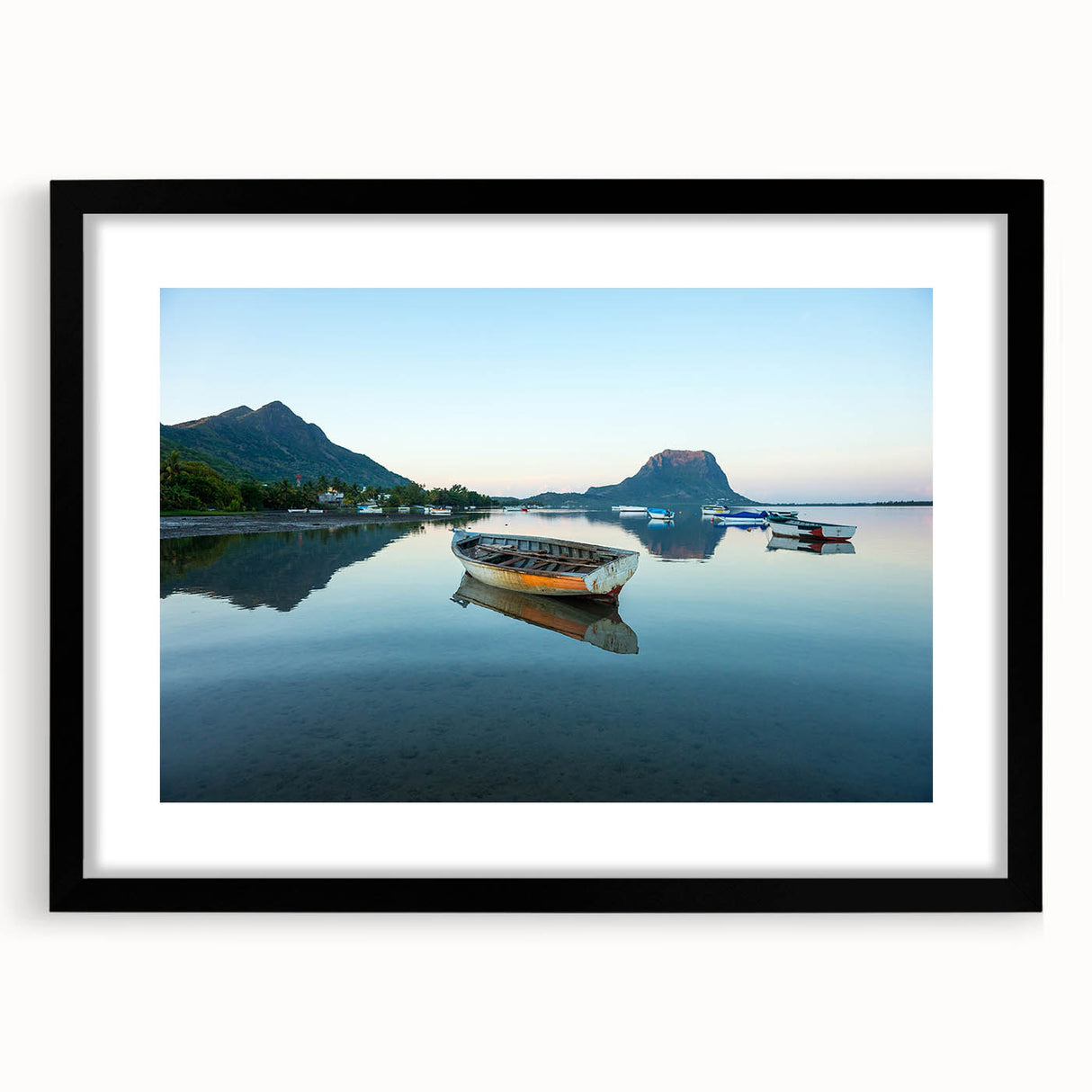 Colorful abstract art print of Caribbean scenery in vibrant hues on a large textured canvas, framed in black.