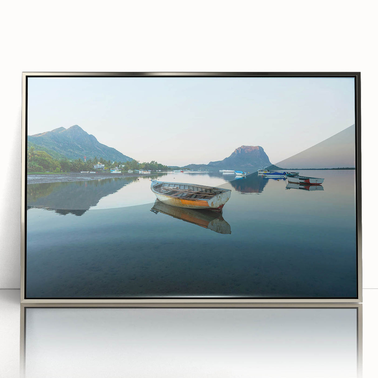 Art deco poster of Caribbean Martinique scenery in silver framed acrylic, featuring vibrant blue and green tones.