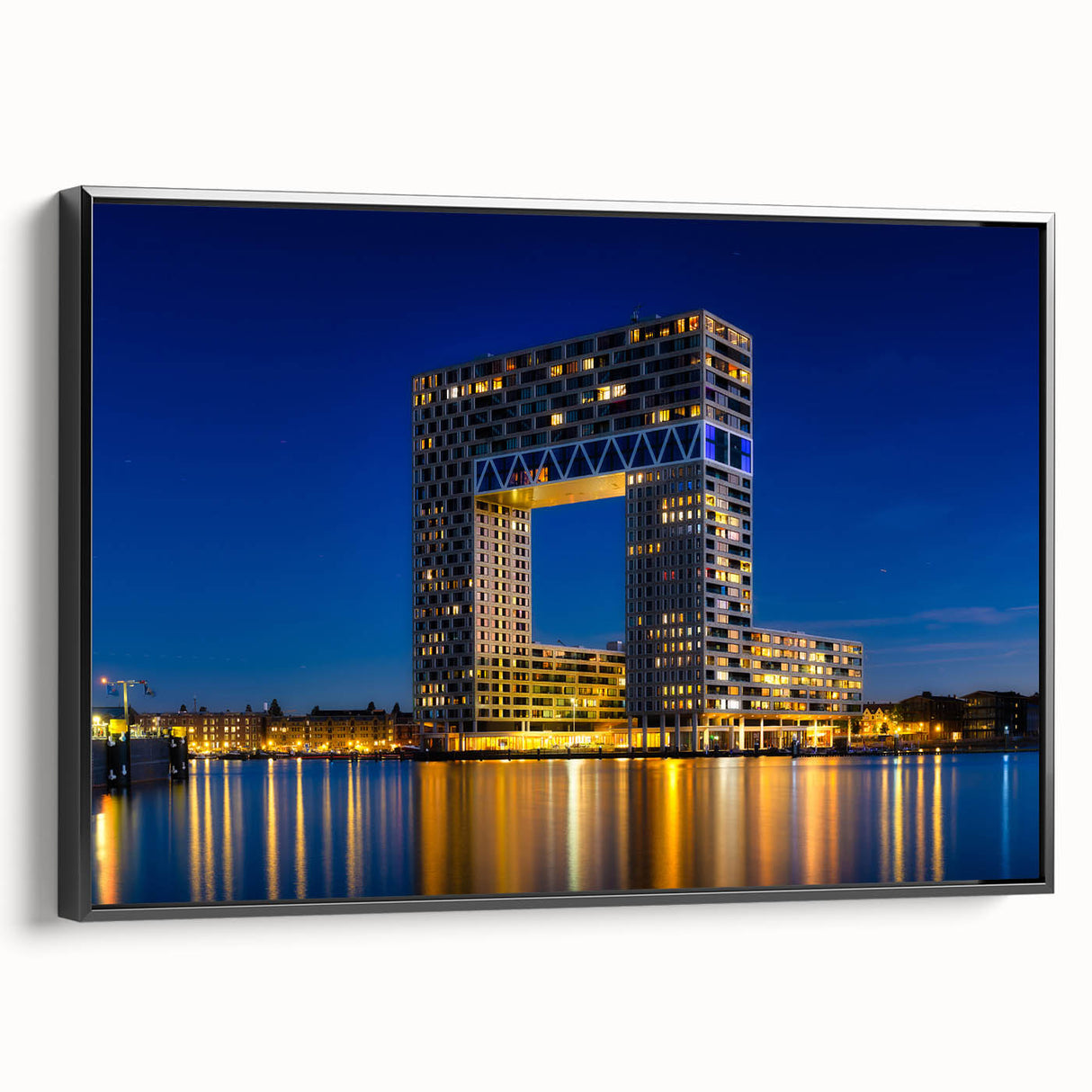 Black and white framed canvas of Amsterdam landscape with vintage poster art style, ideal for bedroom wall decor.