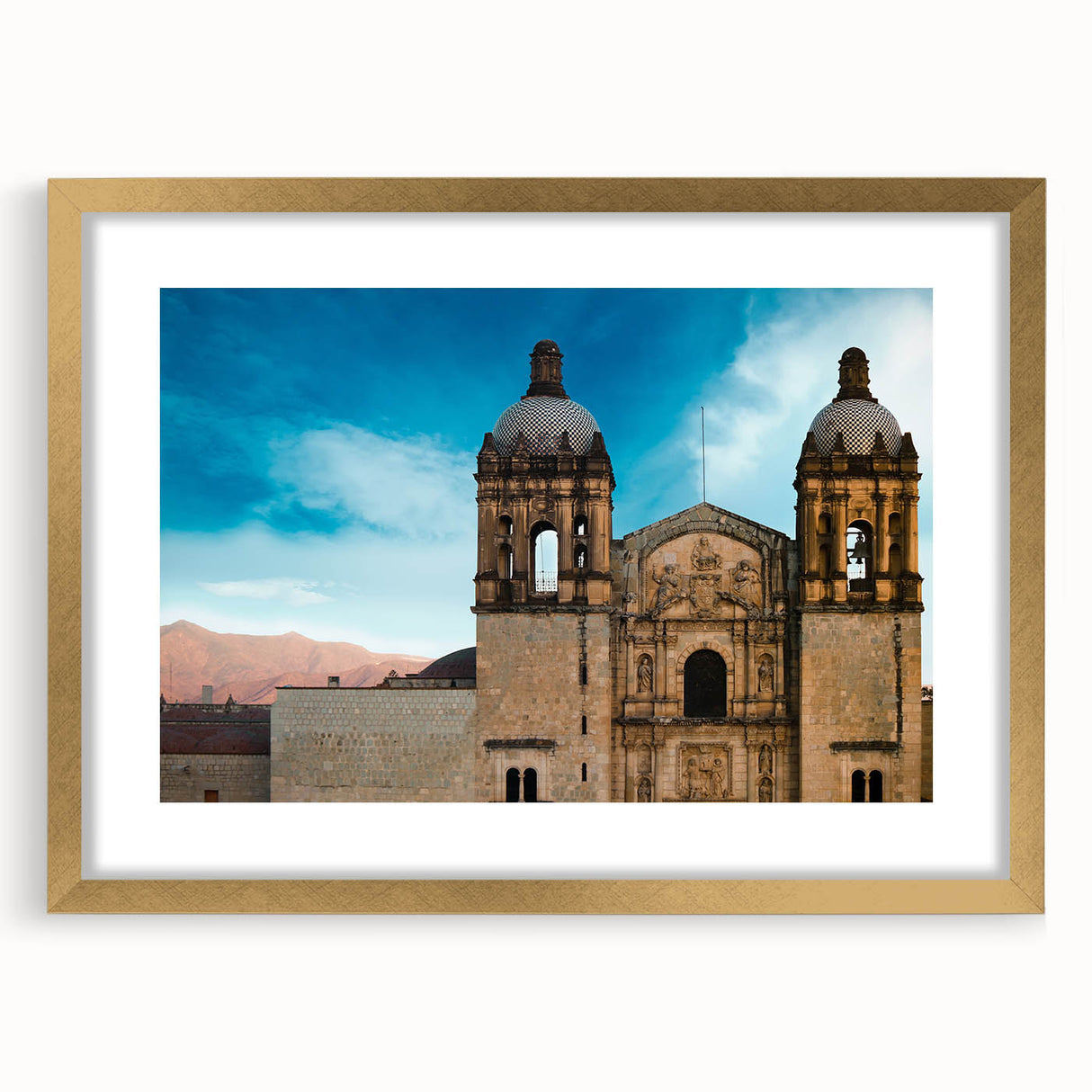 Extra large abstract art print featuring textured scenery of Oaxaca in muted earth tones, framed in gold.