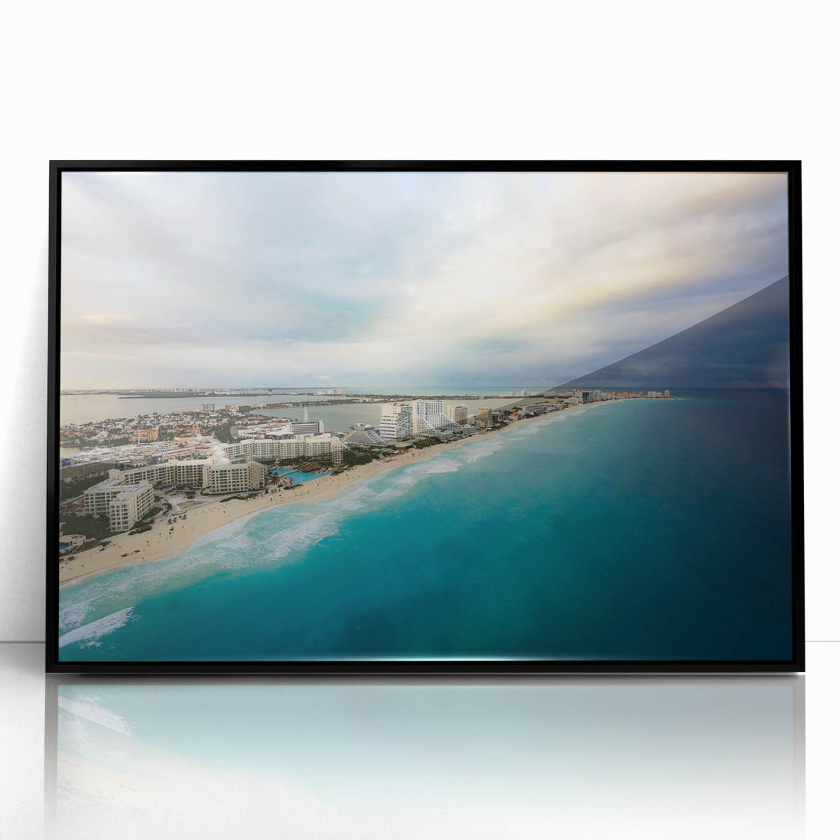 Large abstract wall art depicting a swirling pattern in blue and teal on a framed acrylic.