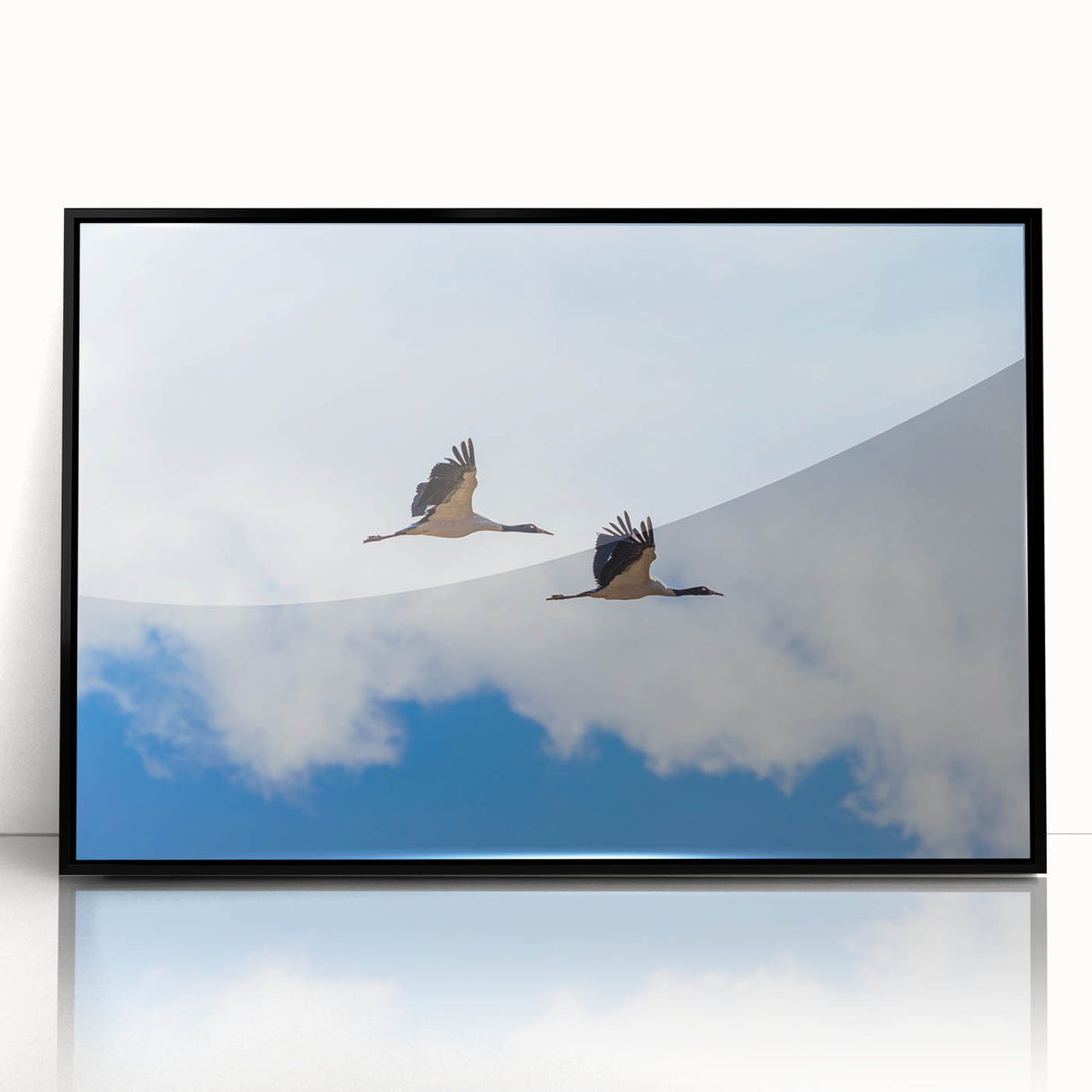 Large abstract wall art depicting a Bhutanese scenery in muted earth tones, framed in black acrylic.