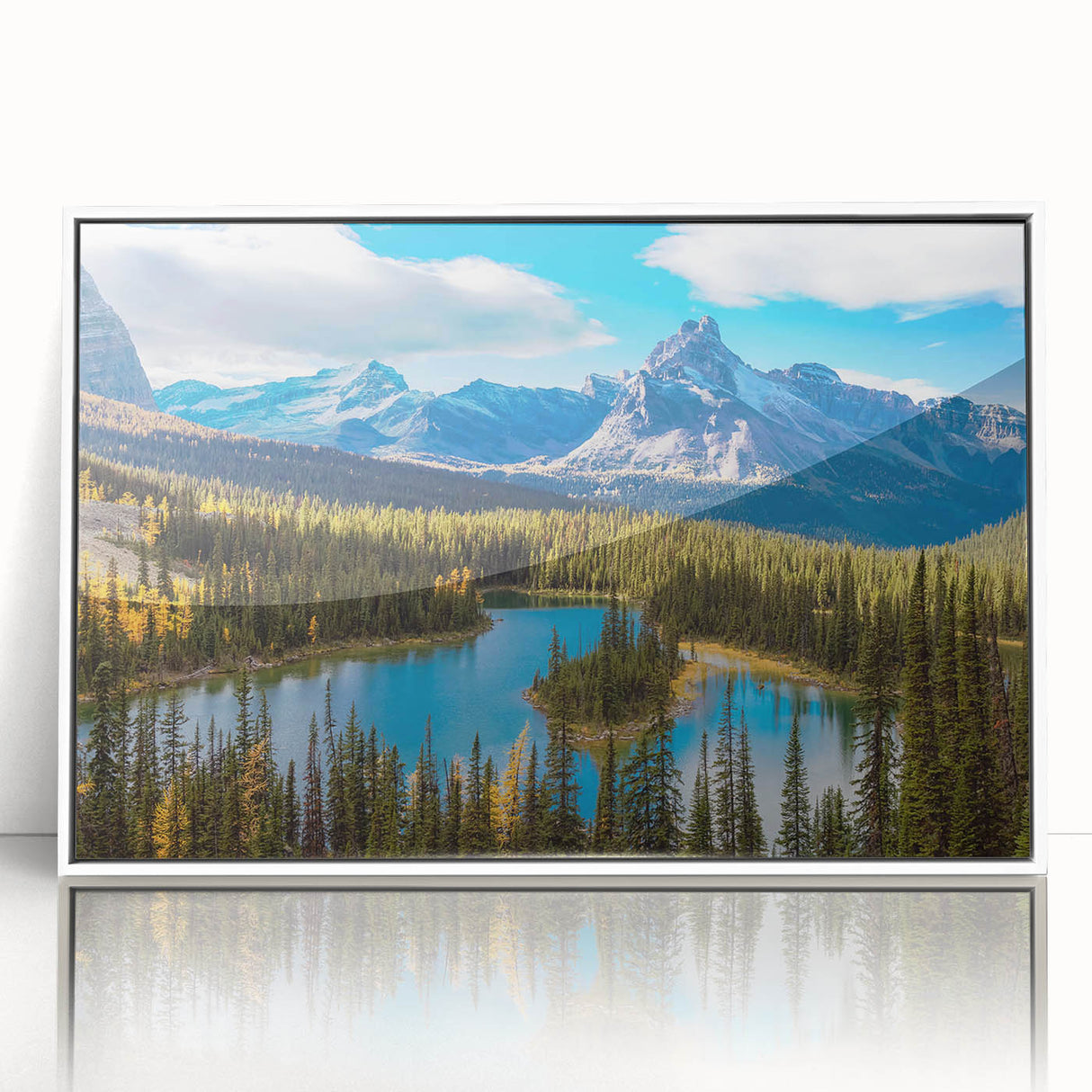 Acrylic print of a serene British Columbia landscape in muted green and blue tones, framed in white.