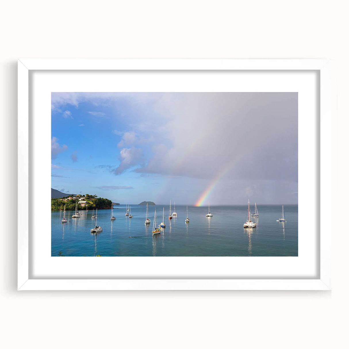 Textured art featuring an abstract depiction of the Caribbean landscape in muted blue and green tones on a framed white mat.