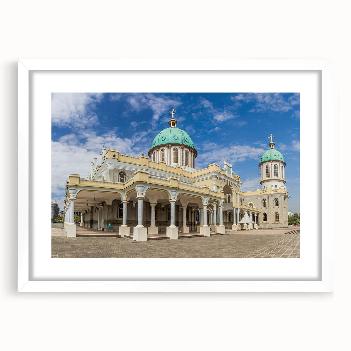 Extra large abstract art print of an Ethiopian landscape in textured earth tones, framed with a white mat.