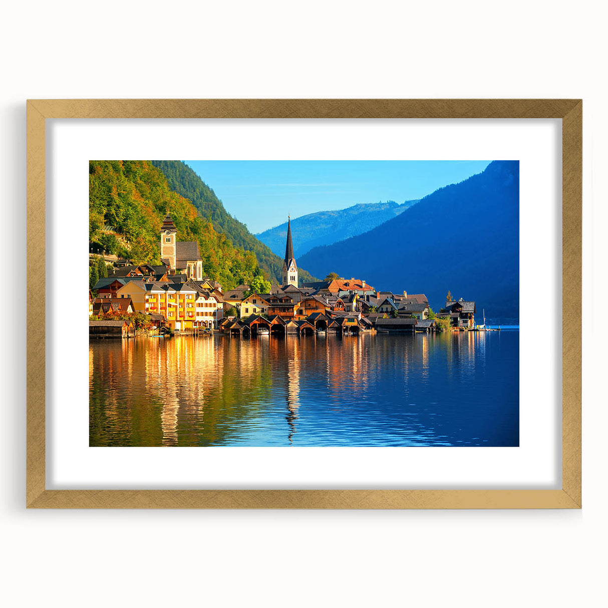 Abstract art print of a European landscape in muted gold and blue tones, framed with a gold mat, ideal for dining room decor.