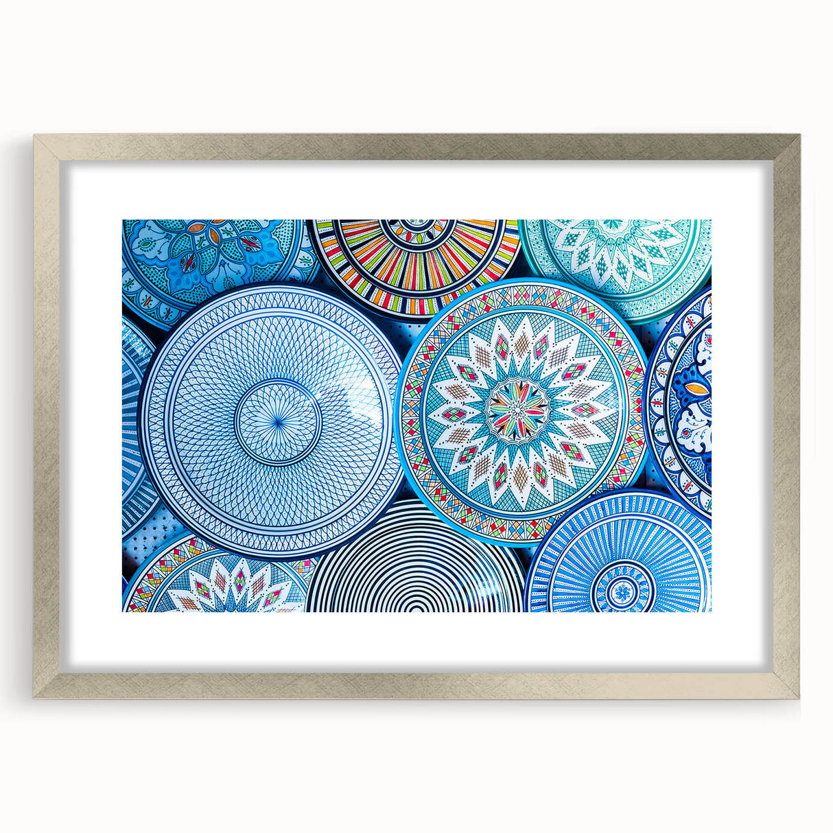 Abstract art print of a Moroccan landscape in muted earth tones on a framed silver mat, ideal for dining room decor.