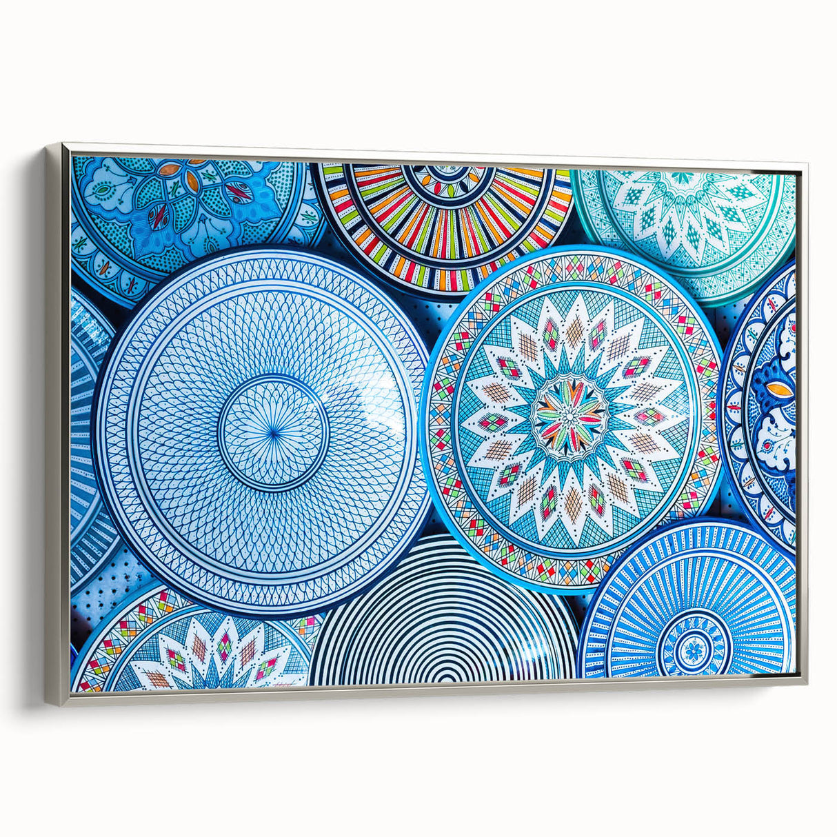 Vintage poster art of a Moroccan landscape in vibrant colors on a framed canvas, ideal for living room decor.