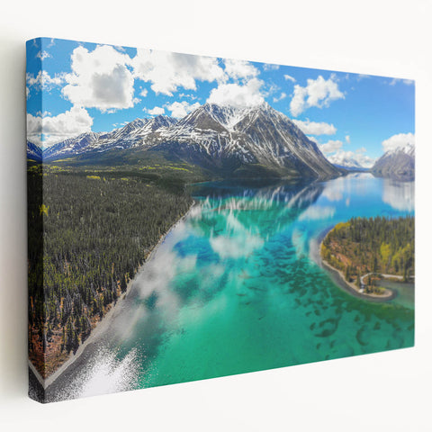 Scenic Yukon landscape on stretched canvas, featuring muted green and blue tones, ideal for kitchen wall art.