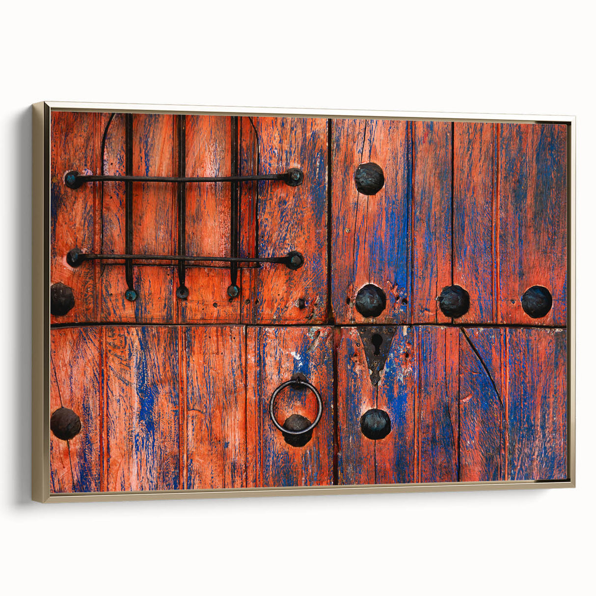 Framed canvas wall art depicting a vintage-style landscape of Baja California with muted gold and black tones.