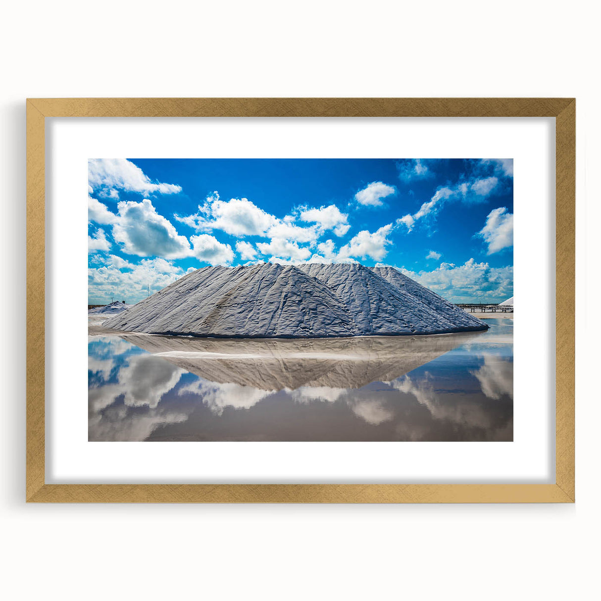 Landscape art painting of Yucatan, Mexico, in a gold frame, featuring colorful vintage poster art on a black background.