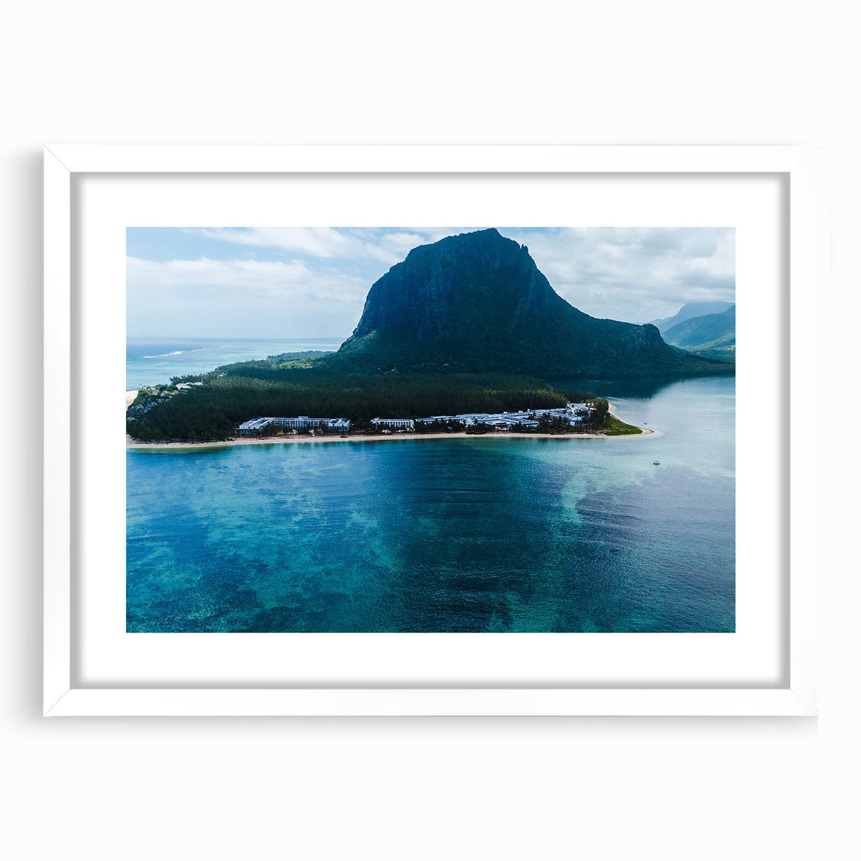 Extra large abstract art print of a Mauritian landscape in textured style, with vibrant earth tones, framed in white.