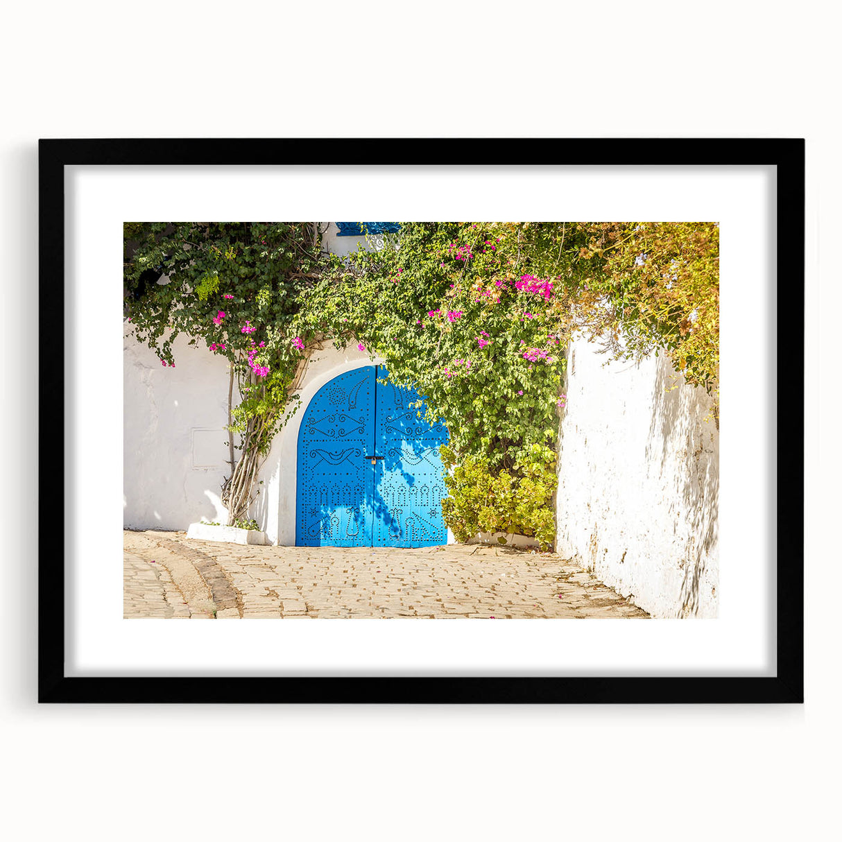 Extra large abstract art print of a colorful, textured scenery of Tunisia on a black framed canvas.