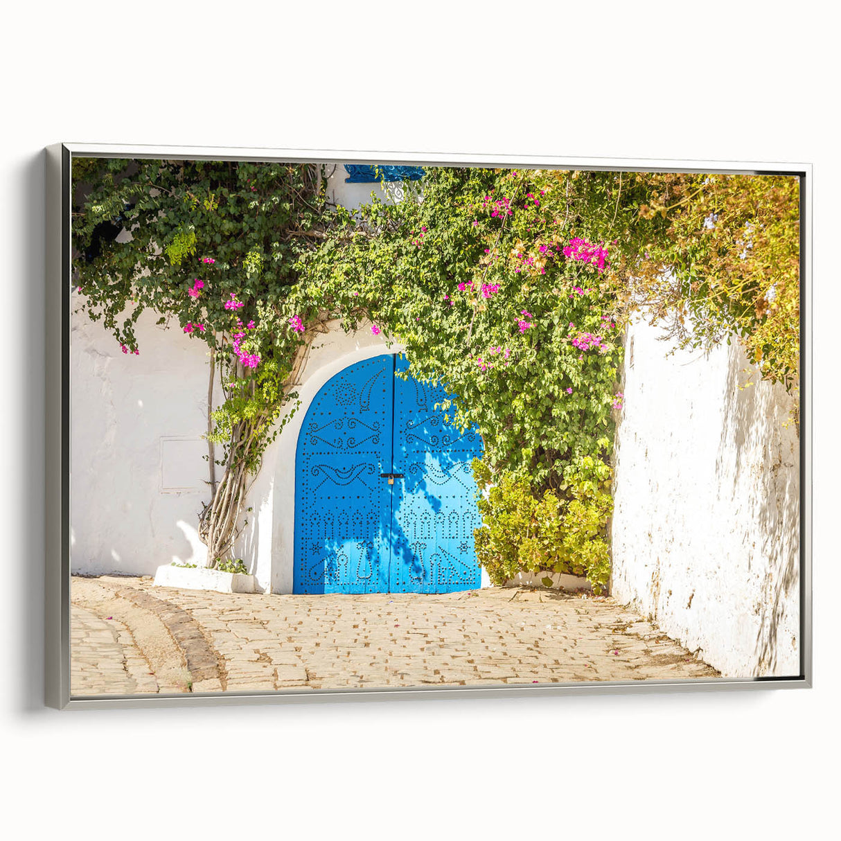 Framed canvas of a Tunisian landscape painting in vibrant colors, ideal for adding a vintage touch to any room.