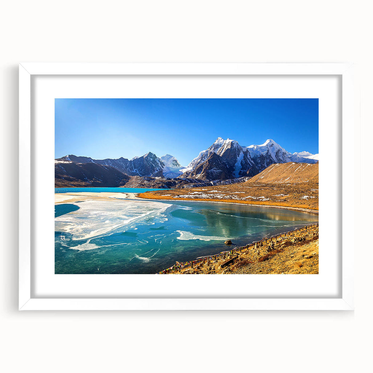 Abstract art print of a serene Indian landscape in soft blue and green hues, framed with a white mat.