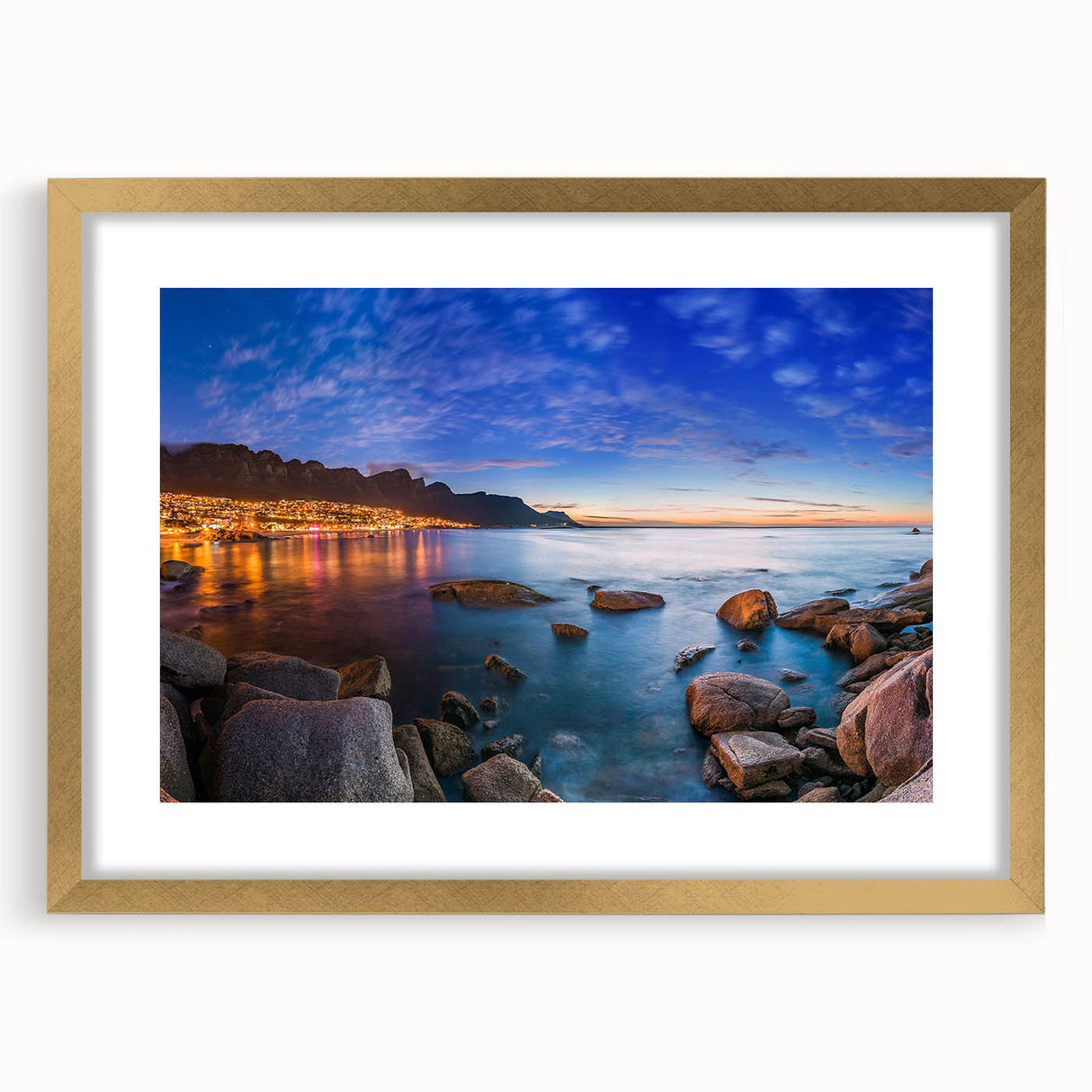 Extra large abstract art print featuring a textured African landscape in earth tones, framed in gold.