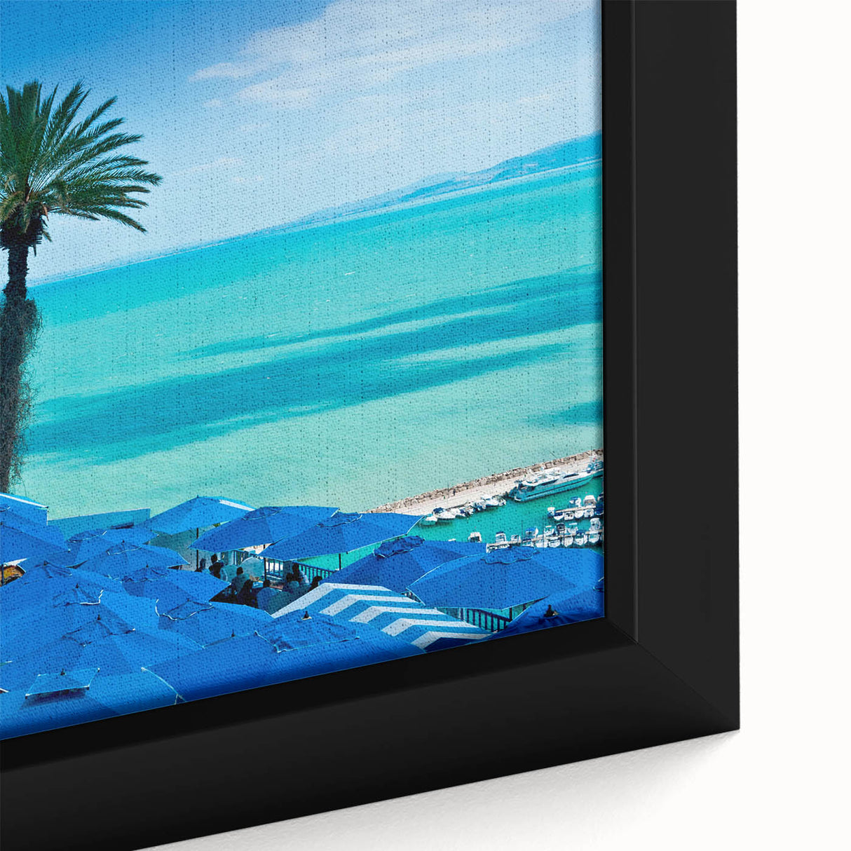 Extra large framed canvas featuring a textured depiction of a Tunisian landscape in black with colorful accents.