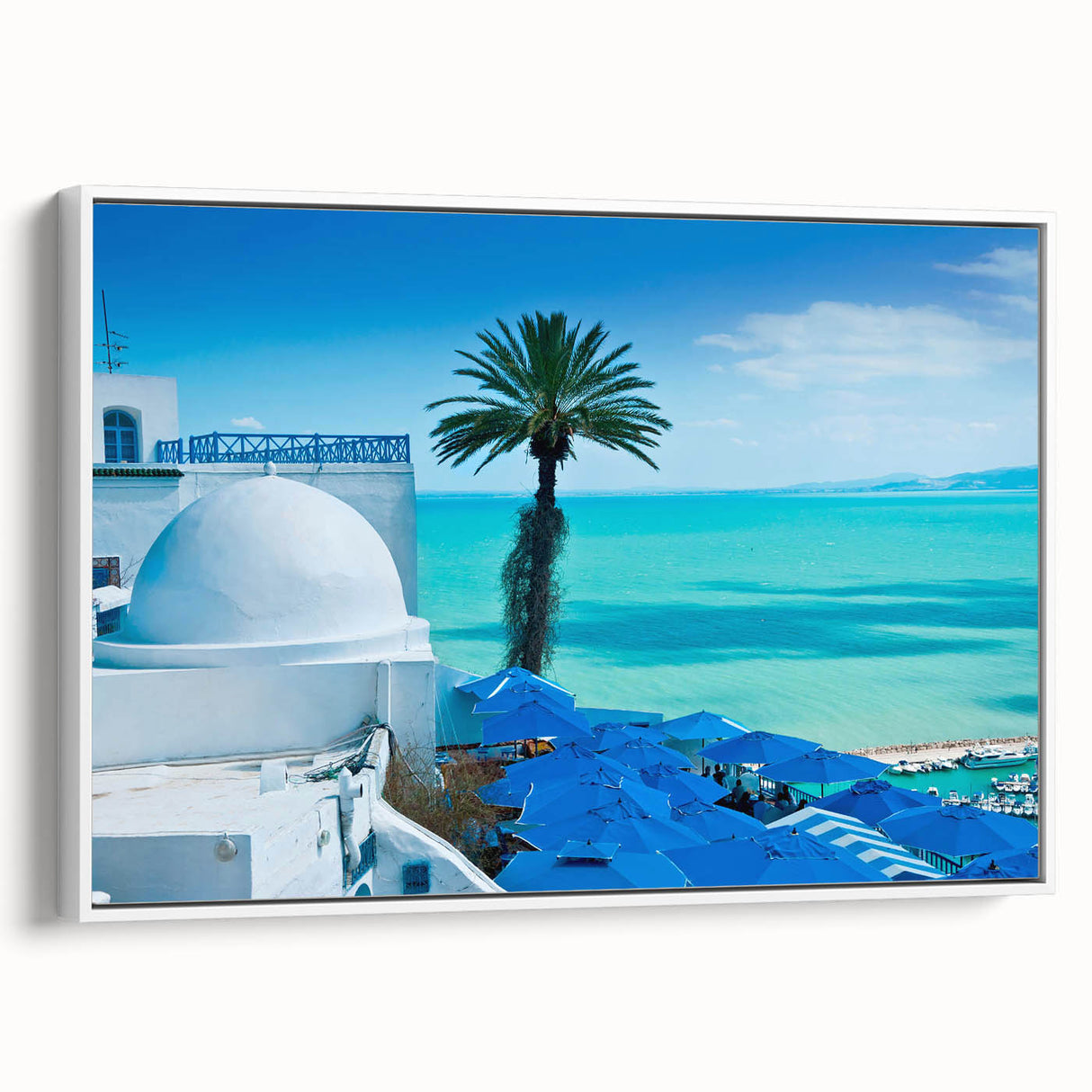 Vintage poster art of a Tunisian landscape on framed canvas, featuring vibrant colors and black accents.