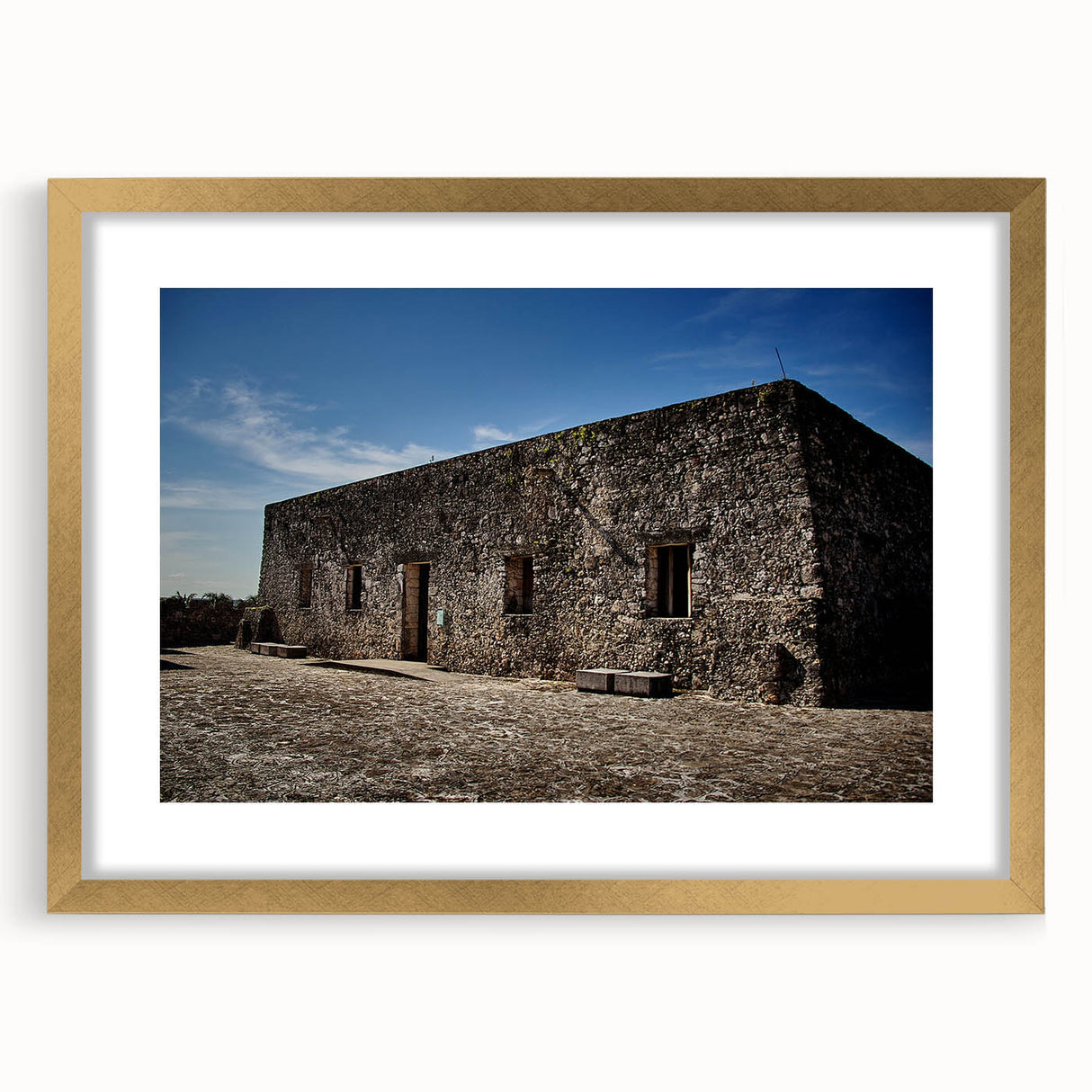 Extra large abstract art print of a textured scenery in Quintana Roo, with muted earth tones on a framed gold mat.