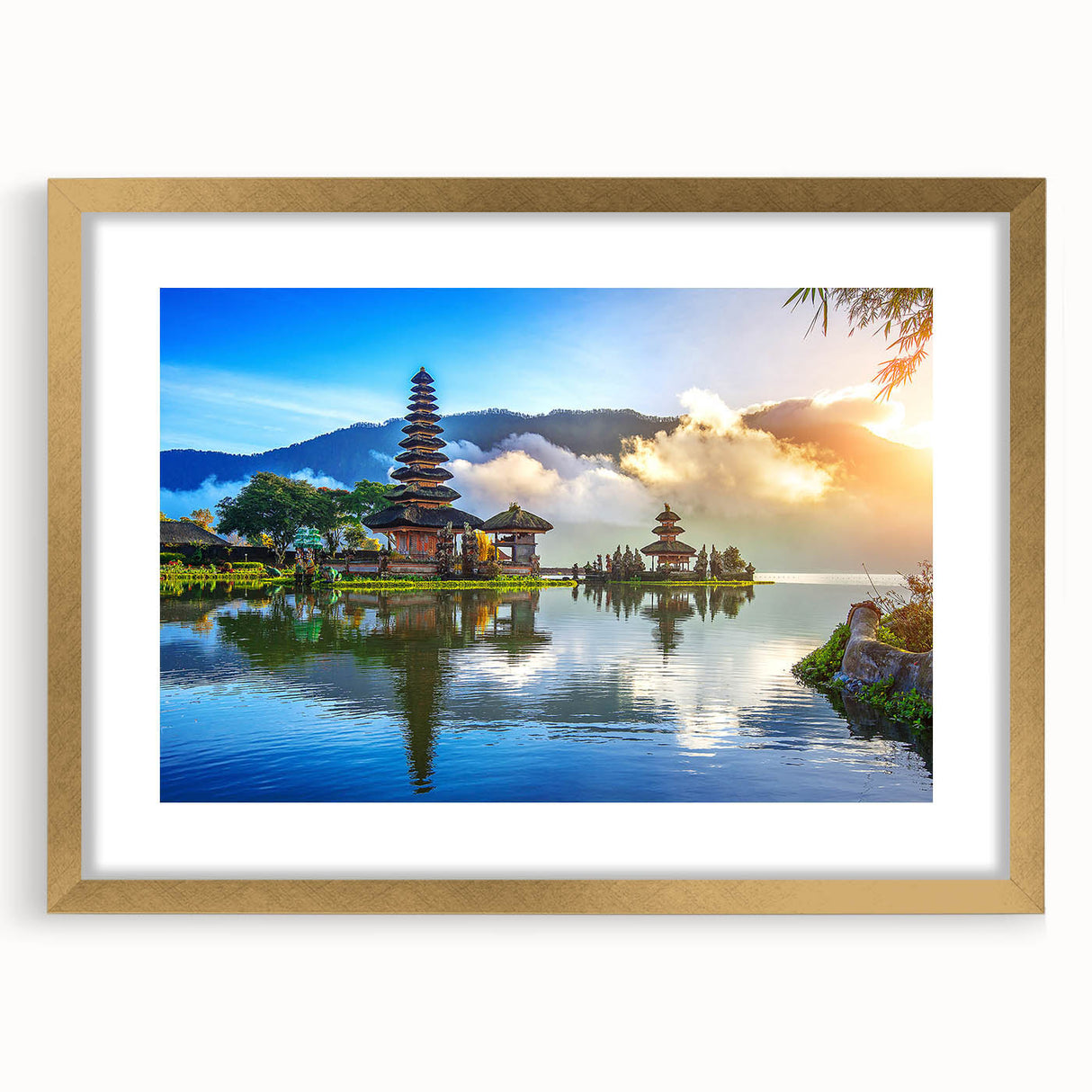 Extra large abstract art print of a textured Indonesian landscape in muted earth tones, framed in gold.