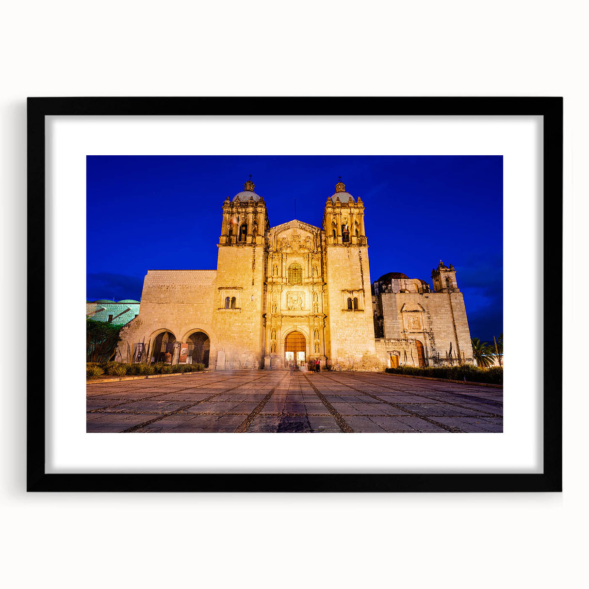 Colorful abstract art print of a textured scenery in Oaxaca, Mexico, in a black frame.