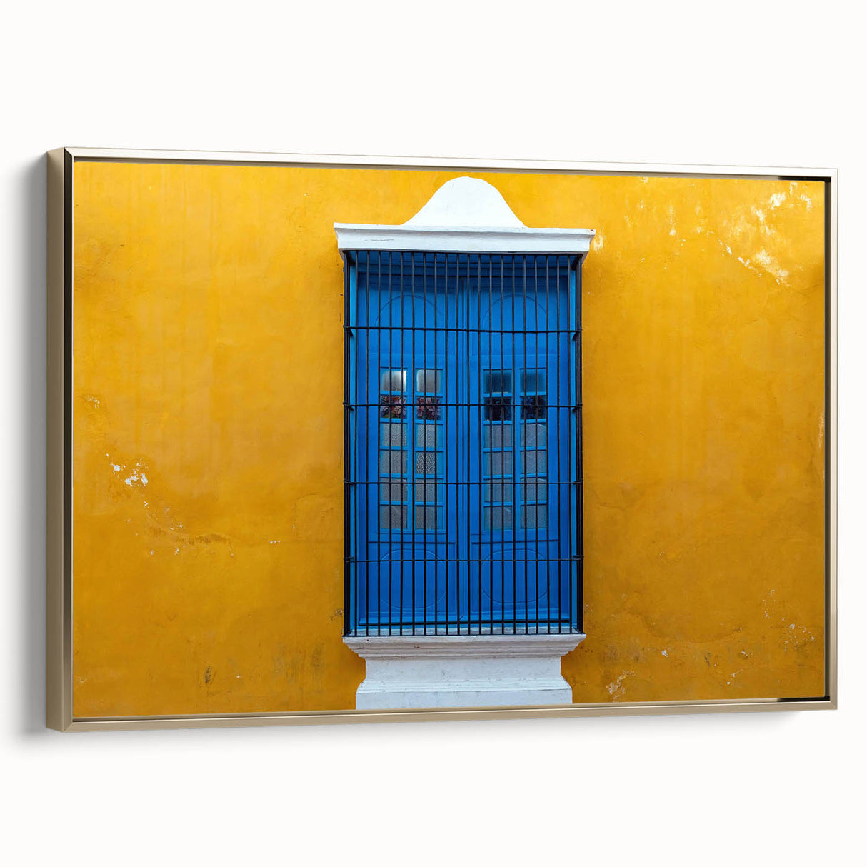 Framed canvas featuring a vintage-style landscape painting of Yucatán, Mexico, with black and gold tones.