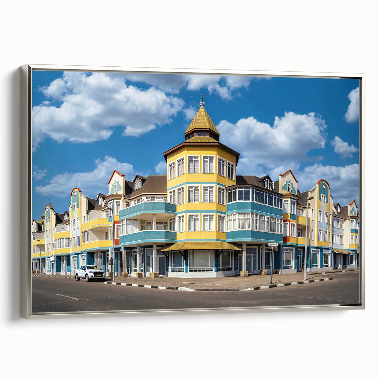 Vintage poster art of a Namibian landscape on a framed canvas, featuring a monochrome black palette.