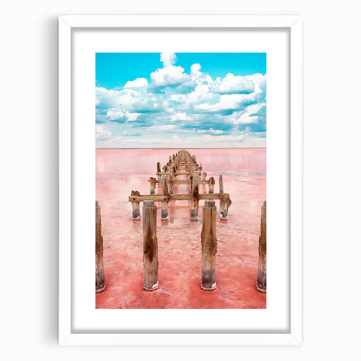 Abstract art print of Yucatan scenery in muted earth tones, framed with a white mat.
