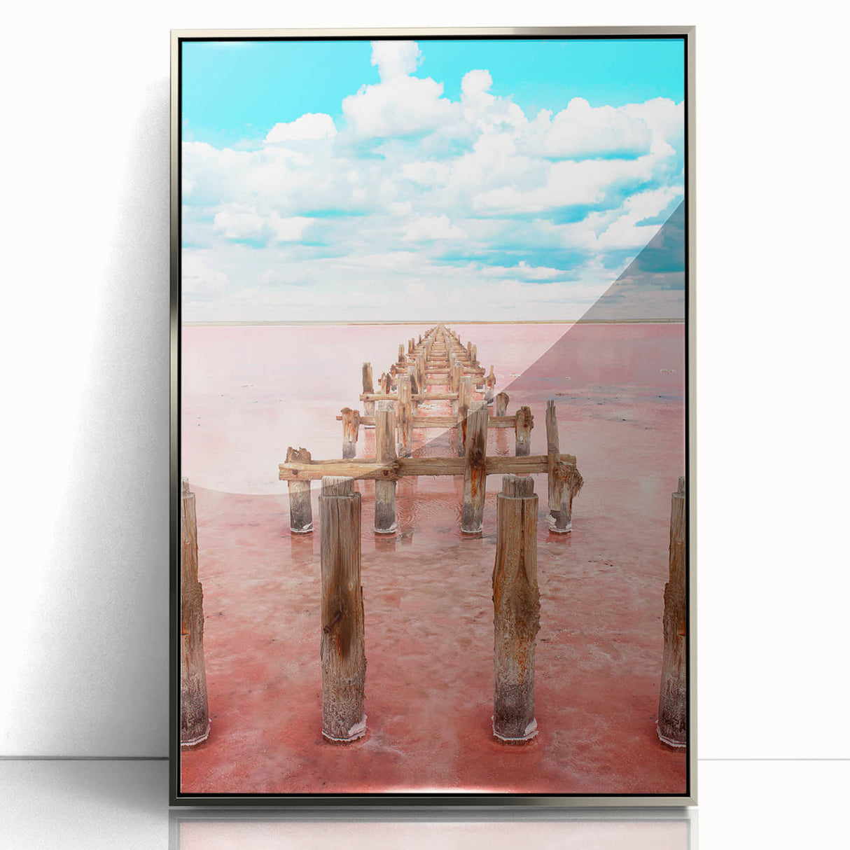 Mid-century modernist art depicting Yucatan scenery in muted earth tones on a silver-framed acrylic print.