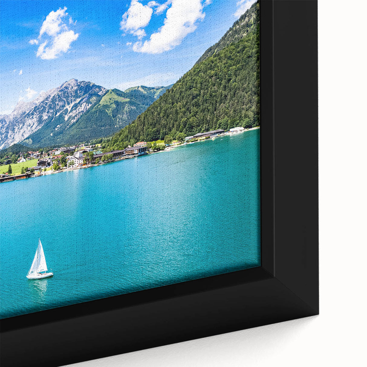 Extra large framed canvas featuring a textured depiction of a European scenery in black with vibrant, colorful accents.