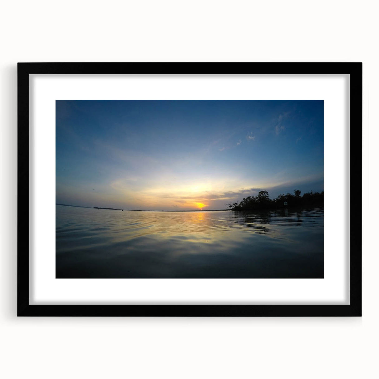 Extra large abstract art print depicting vibrant, colorful scenery of Yucatan, on a textured canvas, framed in black.