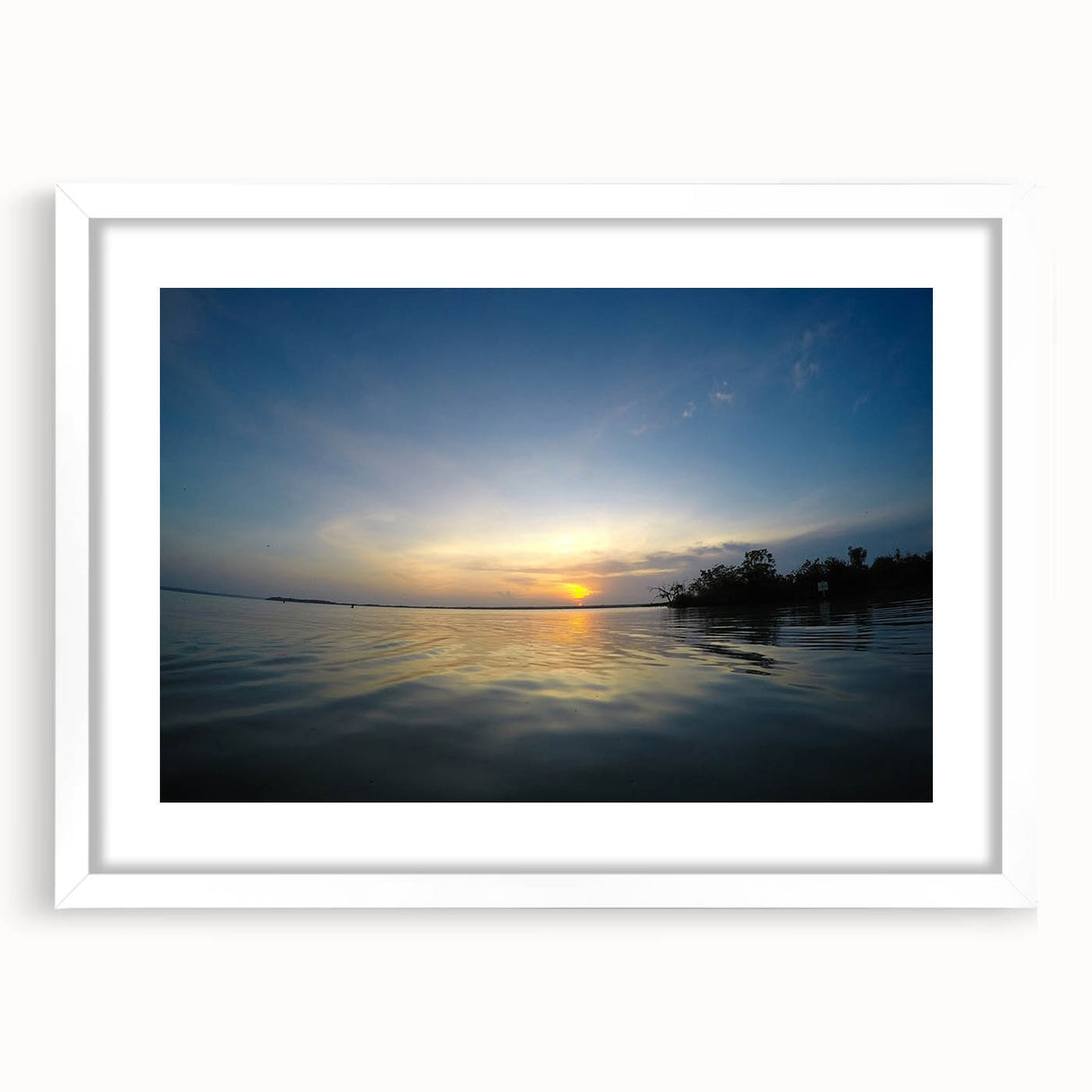 Abstract art print of Yucatan scenery in muted earth tones on a white framed canvas, ideal for dining room decor.