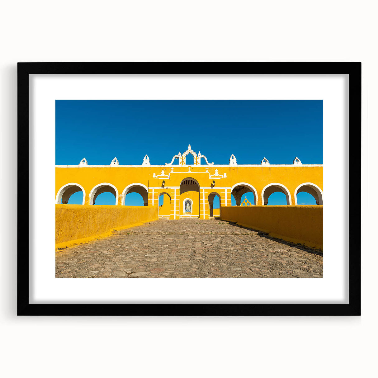 Abstract art print depicting vibrant, colorful scenery of Yucatan with textured details on a large framed canvas.