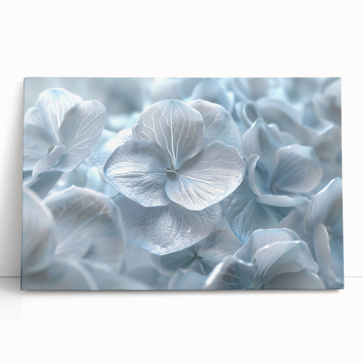 Botanical wall art featuring a vibrant hydrangea design on stretched canvas, showcasing delicate pink and blue flowers against a subtle white backdrop, perfect for home decor.