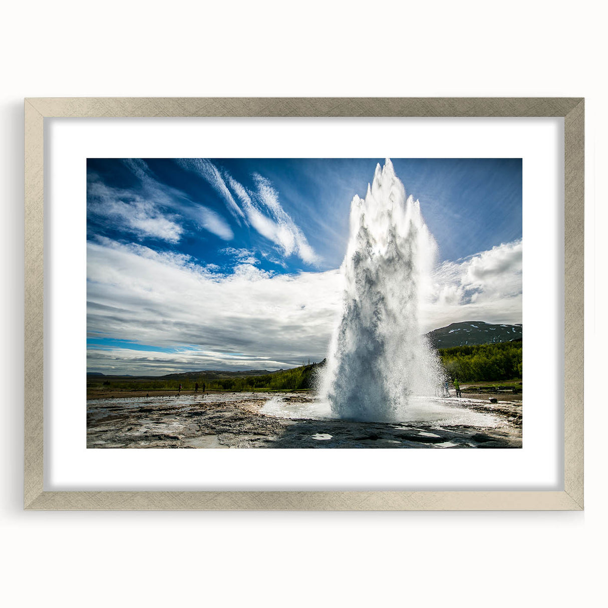 Framed wall art featuring a stunning geyser landscape design, with a sleek silver frame and mat, perfect for enhancing home decor and showcasing nature's beauty.