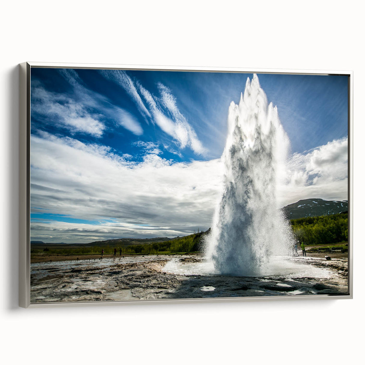 Framed canvas wall art depicting a vibrant geyser landscape design, featuring silver accents and a sleek modern frame, ideal for contemporary home decor.