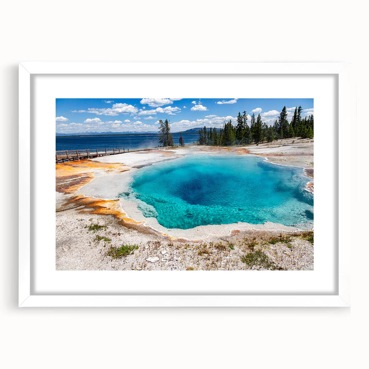 Framed wall art featuring a geyser landscape design, showcasing vibrant colors and intricate details, displayed in a white mat for an elegant finish. Perfect for home decor enthusiasts seeking nature-inspired art.