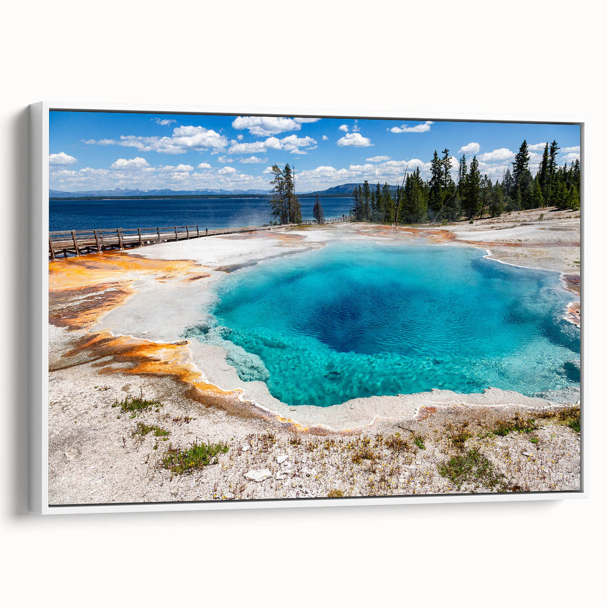 Framed canvas wall art featuring a vibrant geyser landscape design in soothing colors, showcased from a side view against a white background, perfect for home decor.