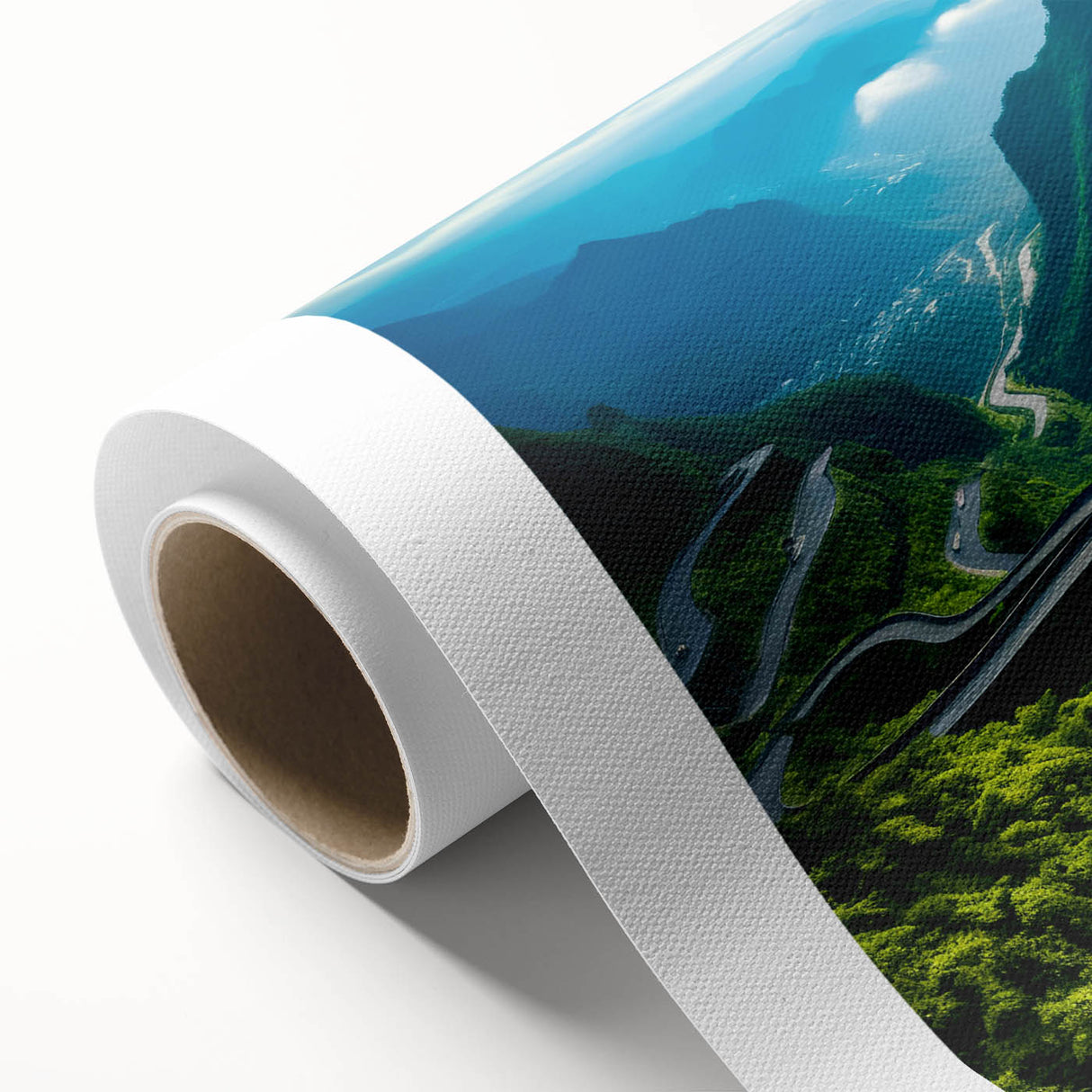 Rolled canvas artwork showcasing a vibrant landscape design with winding roads and colorful scenery, perfect for home decor. Packaged securely in a durable cardboard tube for safe delivery.