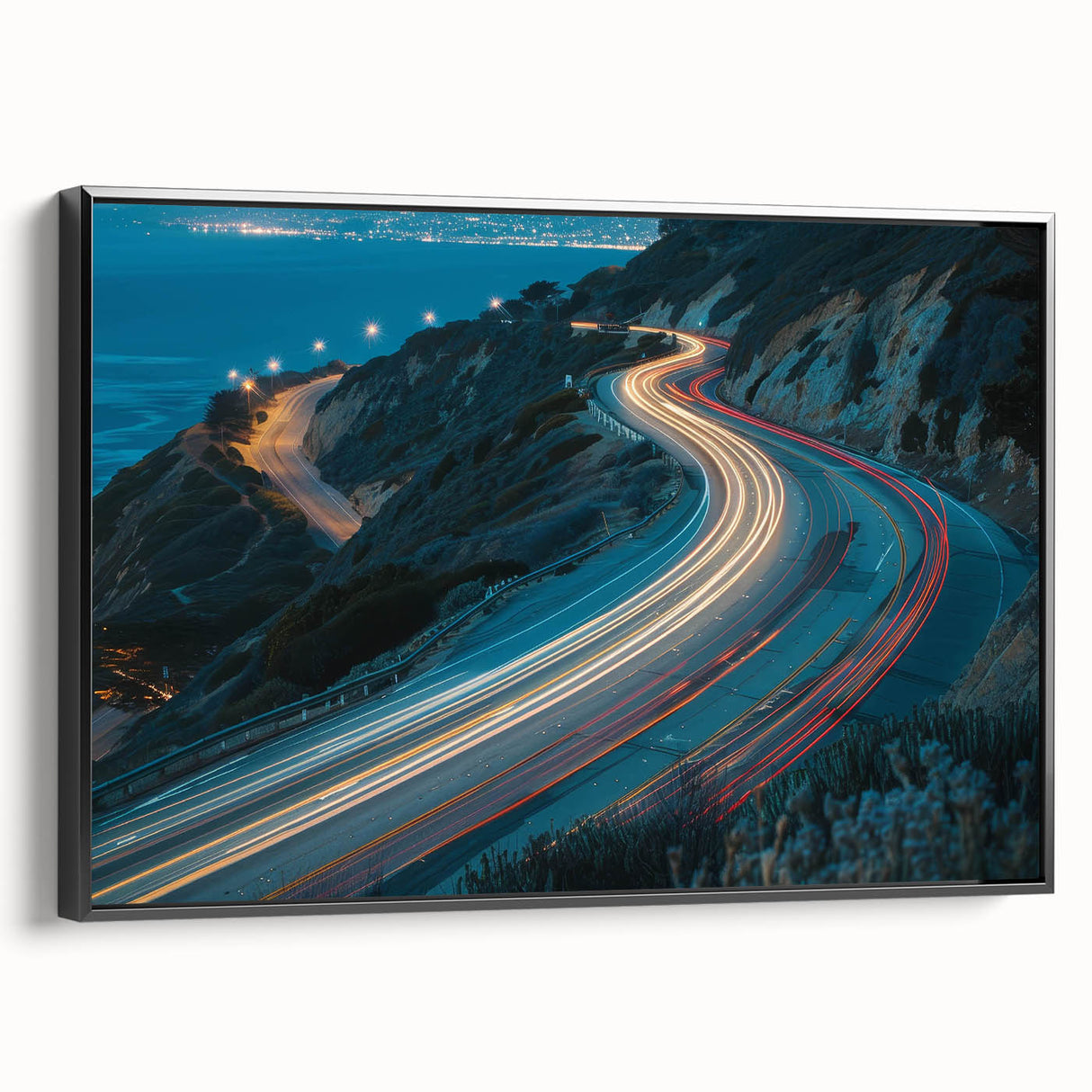 Framed canvas wall art featuring a scenic landscape design with winding roads, presented in a sleek black frame, ideal for home decor enhancement.