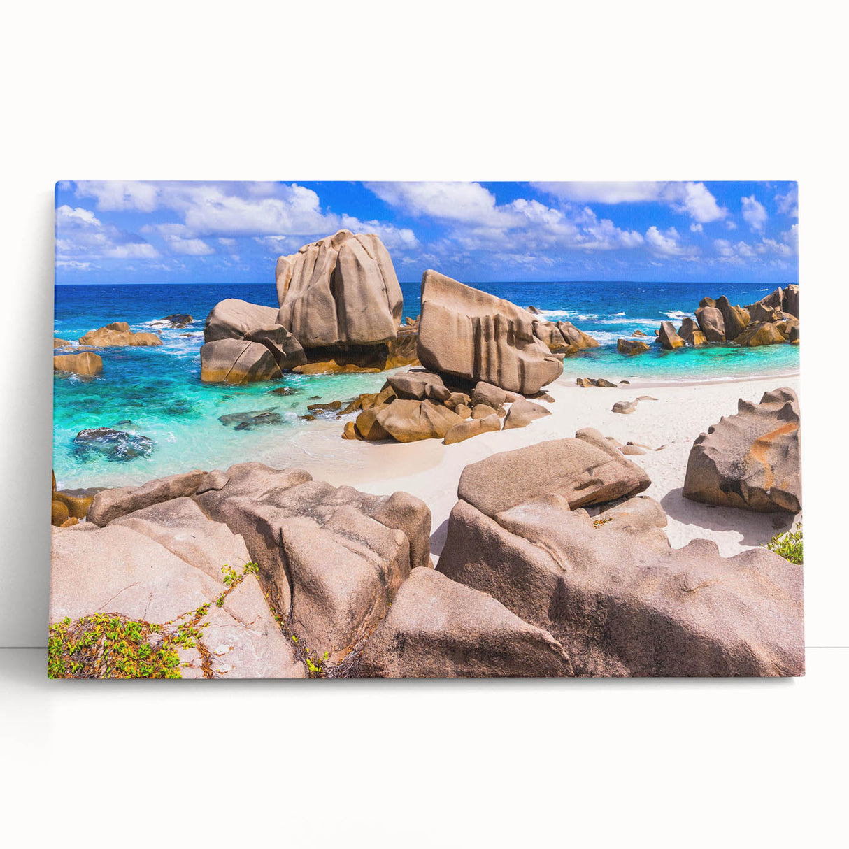 Stretched canvas wall art depicting a serene landscape with rocks and greenery, showcasing vibrant colors and a calming aesthetic, perfect for home decor.
