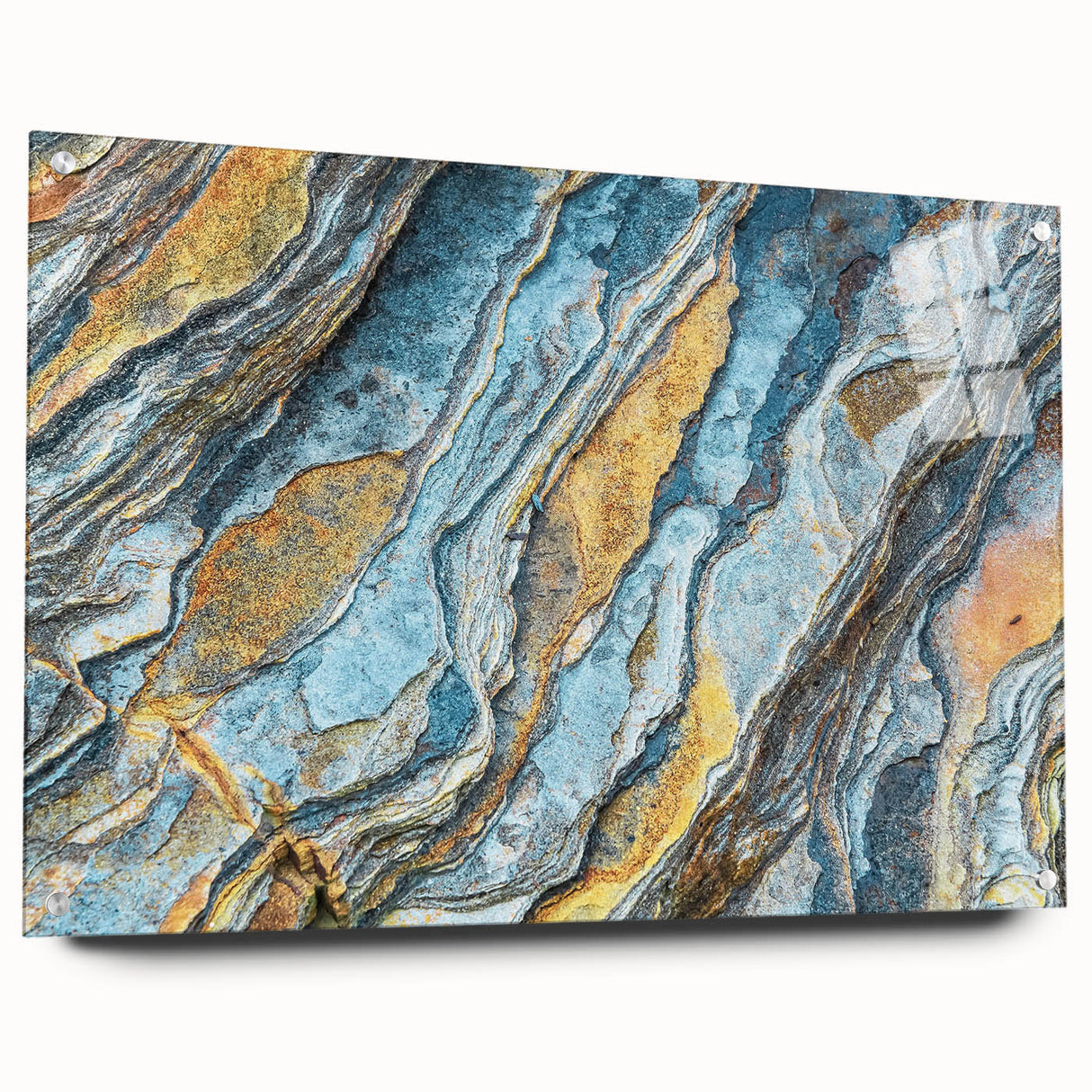 Acrylic glass wall art featuring a vibrant landscape design with rocks and natural elements, displayed at an angle with decorative pins, perfect for modern home decor.
