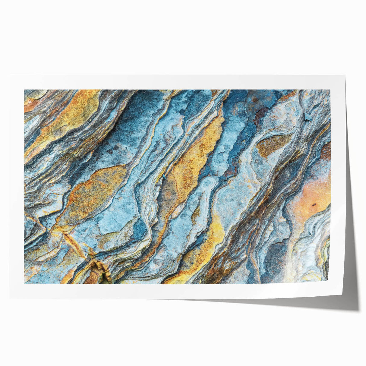 Vibrant rolled print of abstract landscape wall art showcasing colorful rocks and organic shapes, perfect for home decor, presented in a protective cardboard tube.
