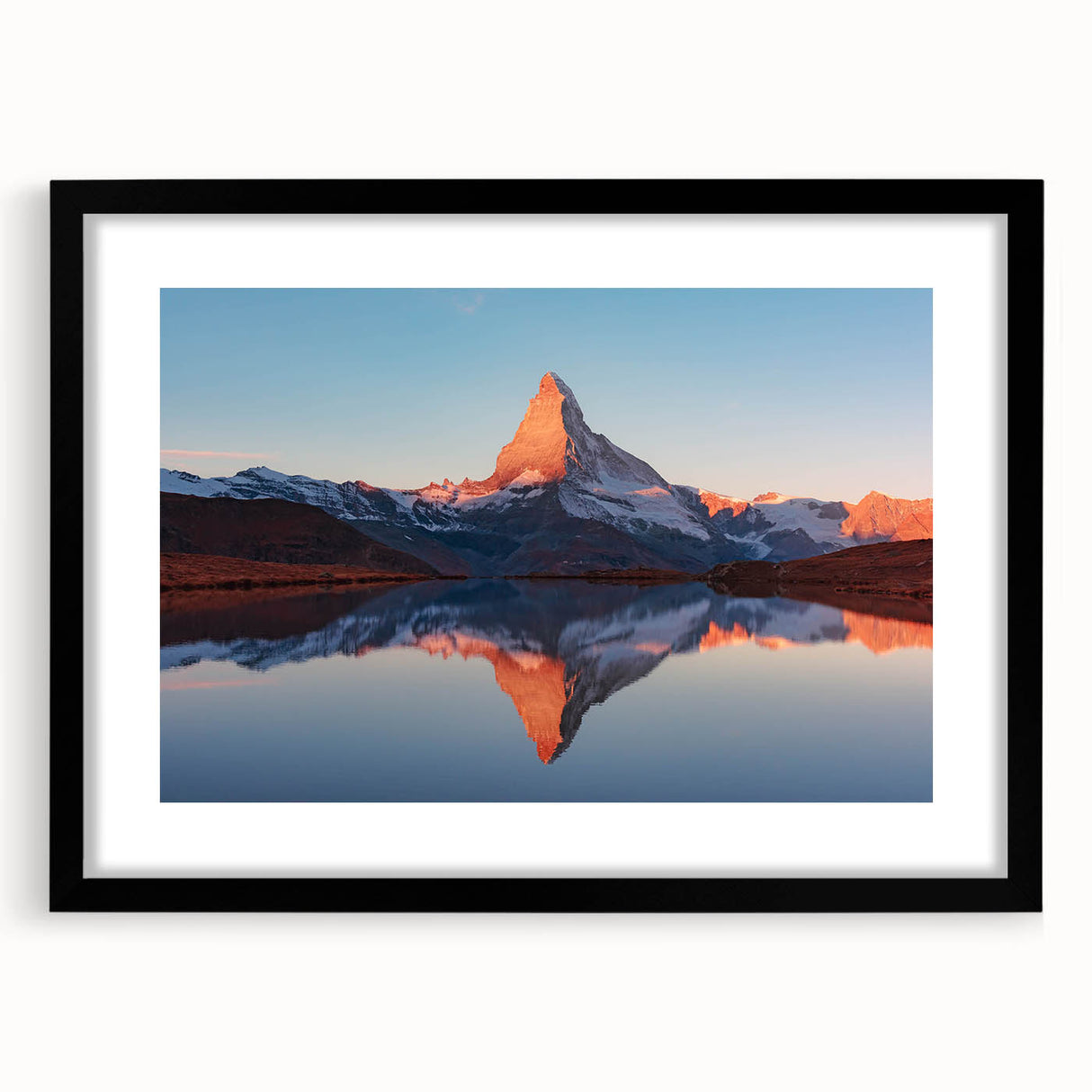 Framed landscape wall art showcasing a serene rocky terrain, featuring a black frame and matting, perfect for home decor enhancement and interior design.