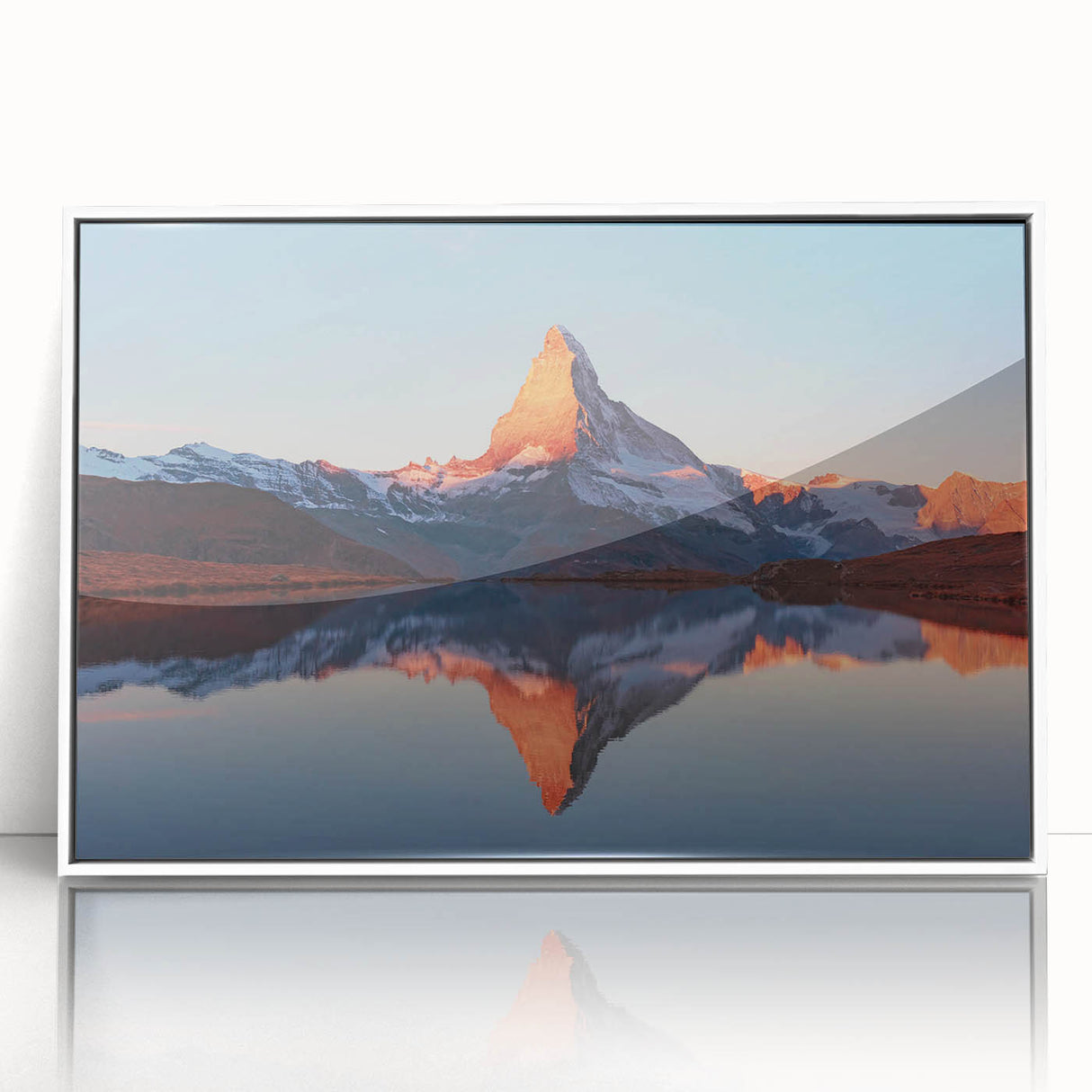 Framed acrylic wall art showcasing a serene landscape with rocky formations, set against a white background, perfect for modern home decor.