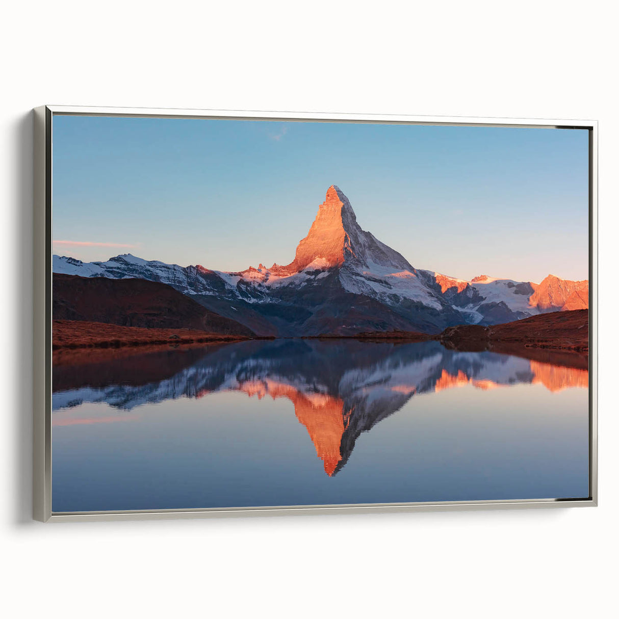 Framed canvas wall art showcasing a serene landscape of rocks, designed with a silver frame. Ideal for modern home decor, enhancing aesthetics with nature-inspired elegance.