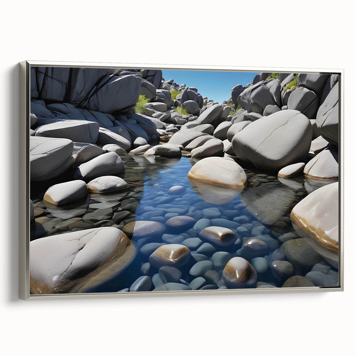 Framed canvas wall art displaying a serene landscape of rocks with a silver frame, ideal for modern home decor. Perfect for adding a tranquil touch to any space.