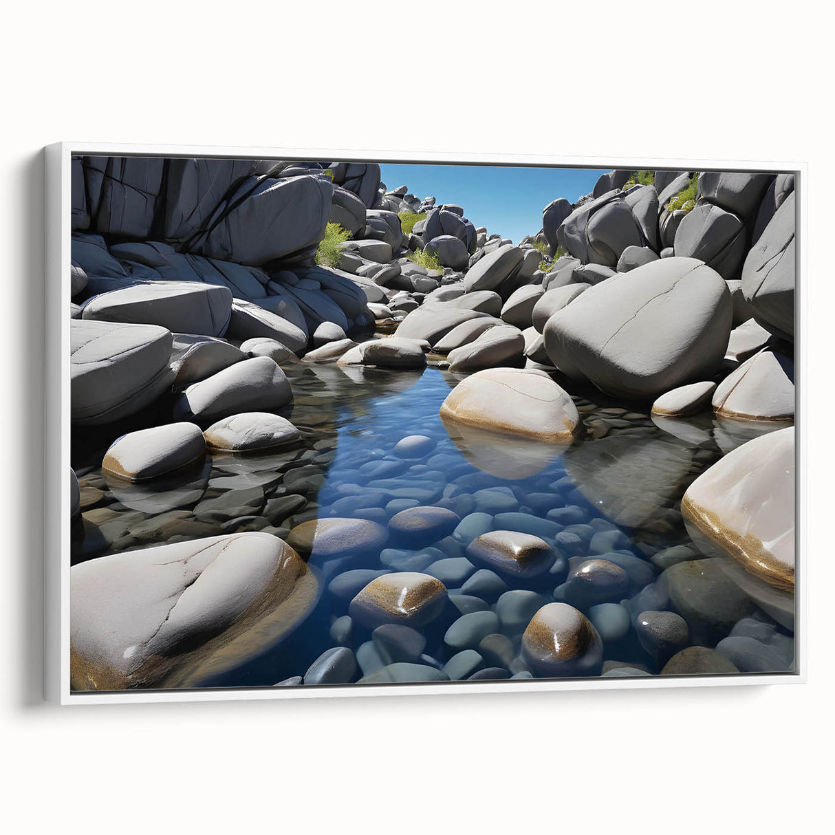 Framed canvas wall art showcasing a serene landscape design with rocks and greenery, presented in a sleek white frame for a modern touch, ideal for home decor.