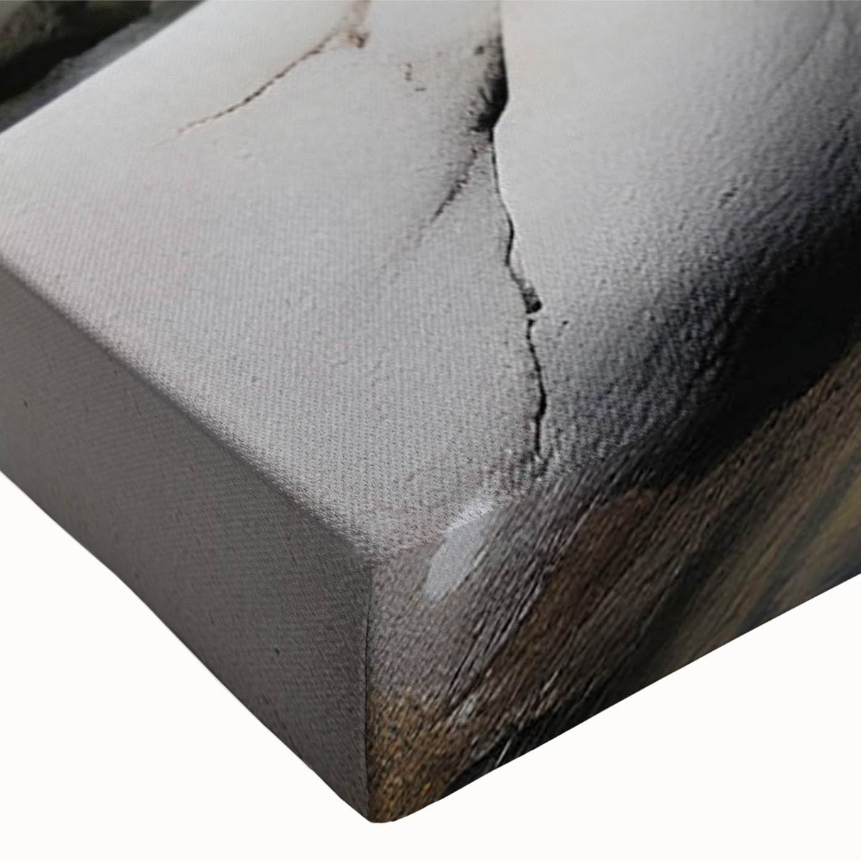 Close-up of a stretched canvas artwork showcasing a vibrant landscape with rocky formations and earthy tones, perfect for modern home decor.