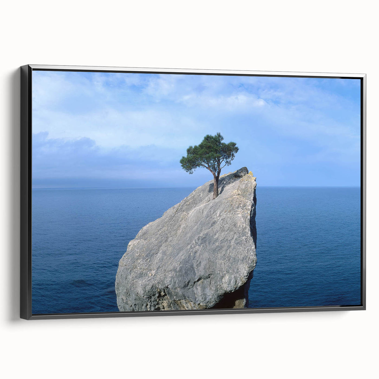 Framed canvas wall art showcasing a serene landscape with rocks and earthy tones, presented from a black side view, perfect for modern home decor.